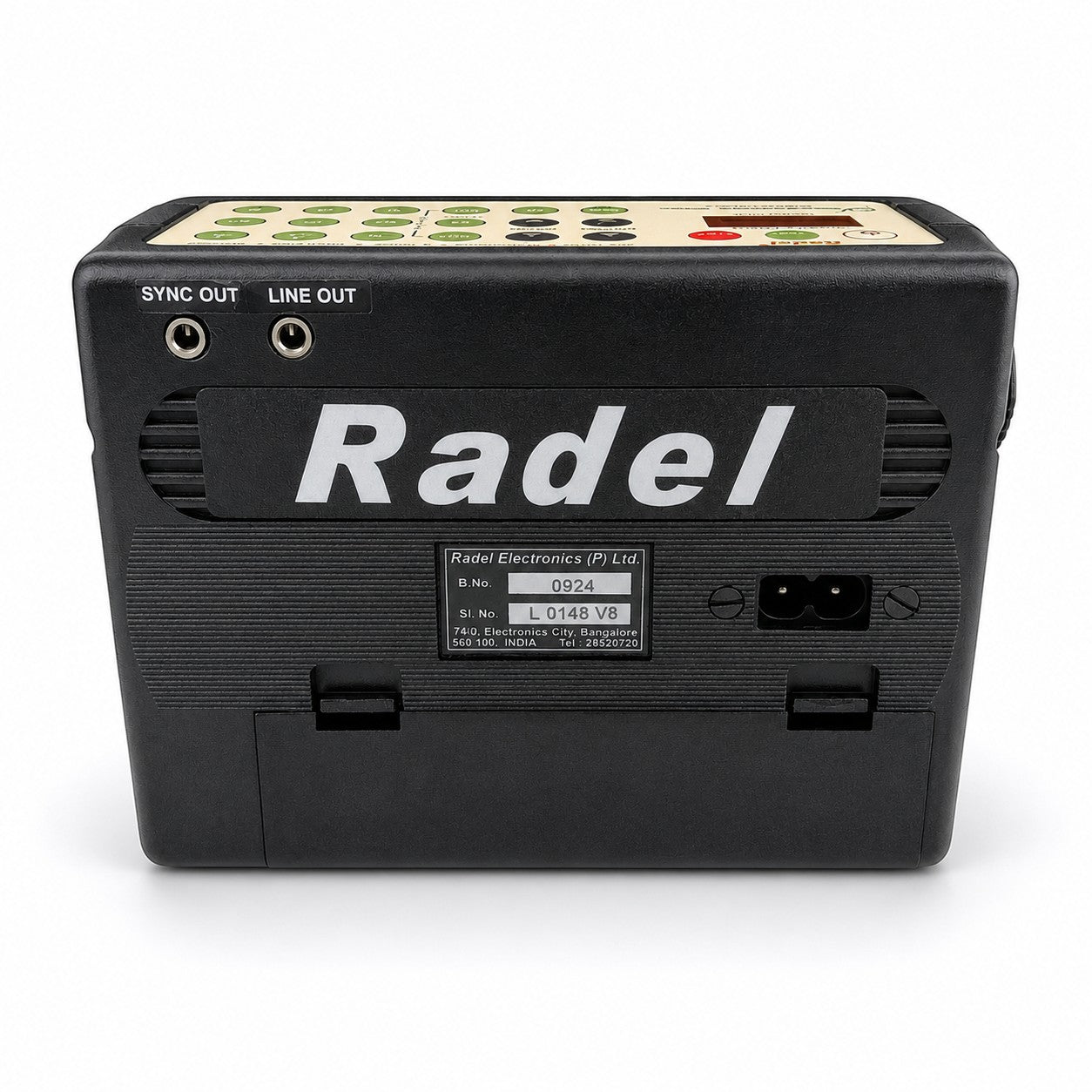 Back view of Prathmesh Music Radel Sunadamala Plus digital lehera instrument showing ports and serial number label
