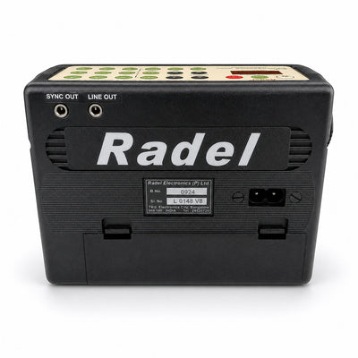 Back view of Prathmesh Music Radel Sunadamala Plus digital lehera instrument showing ports and serial number label