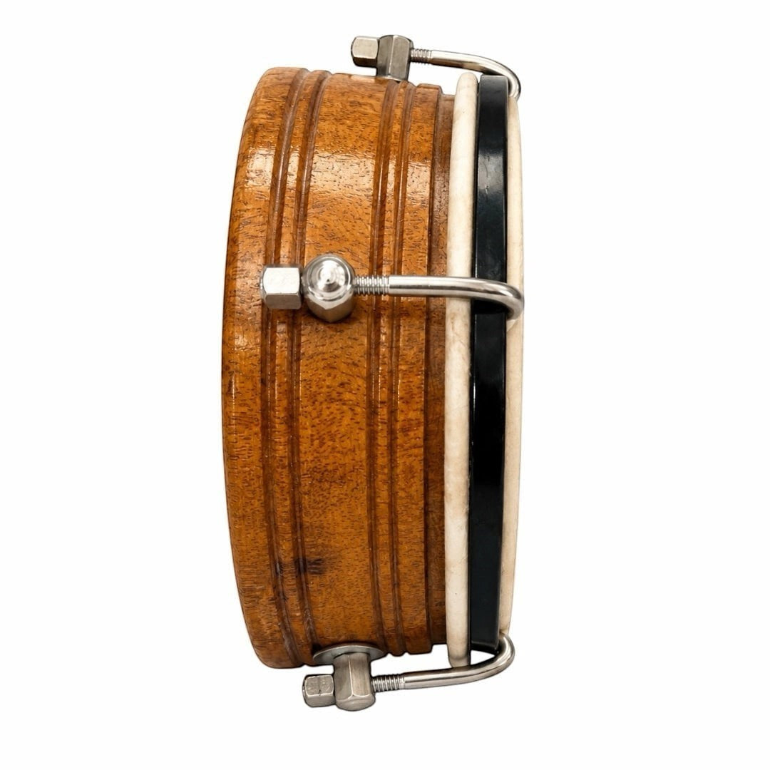 Prathmesh Music 6-inch wooden dimdi drum with a natural wood finish, metal tuning hardware, and a taut drumhead.